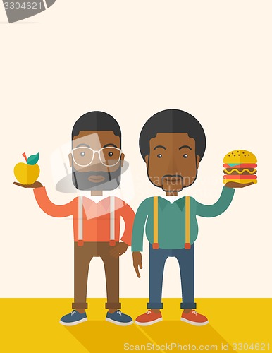 Image of Two black businessmen comparing apple to hamburger.