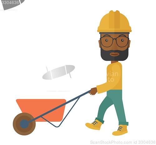 Image of Black Gardener pushing a wheelbarrow.