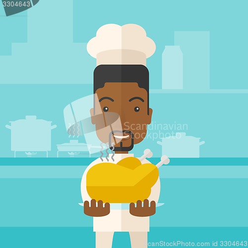 Image of Chef presenting a tasty cooked turkey.