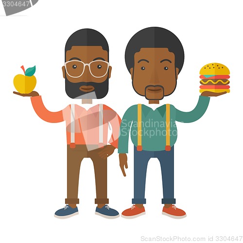 Image of Two black businessmen comparing apple to hamburger.