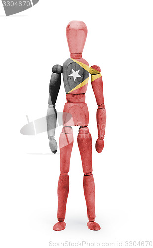 Image of Wood figure mannequin with flag bodypaint - East Timor