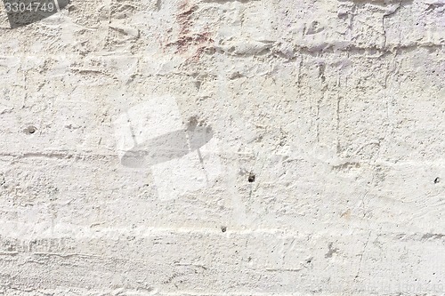 Image of Grungy white concrete wall background