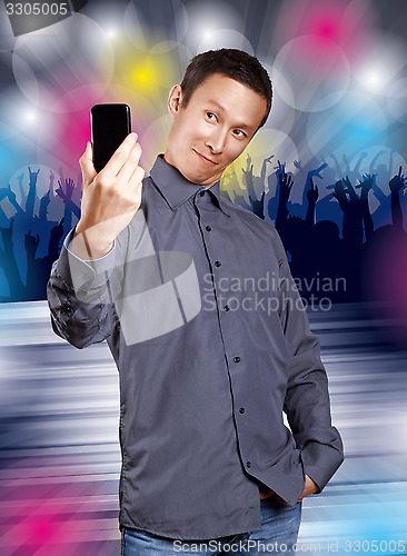 Image of Asian Man Making A Selfie
