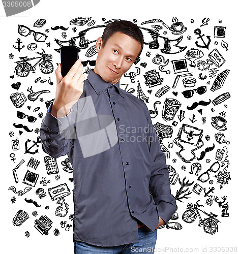 Image of Asian Man Making A Selfie