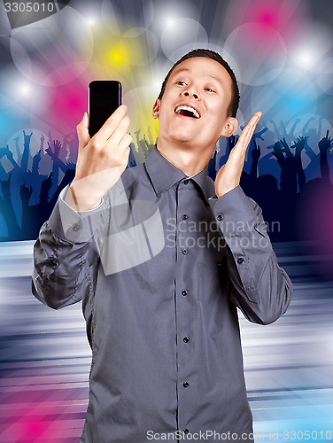 Image of Asian Man Making A Selfie