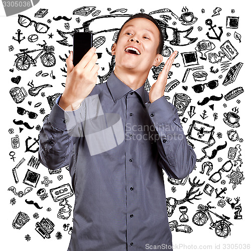 Image of Asian Man Making A Selfie