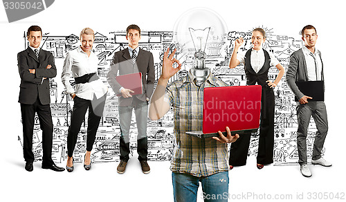 Image of Business Team With Lamp Head