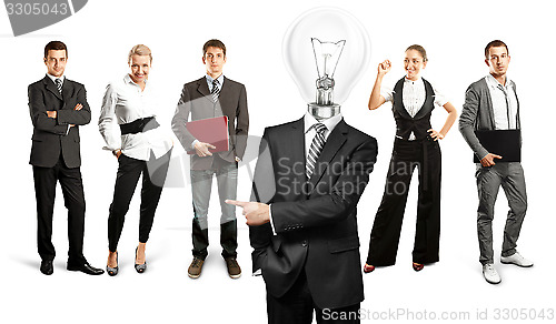 Image of Business Team With Lamp Head