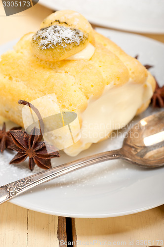 Image of cream roll cake dessert and spices 