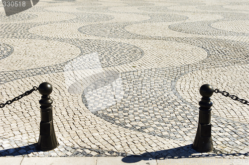 Image of Details in cobblestone plaza