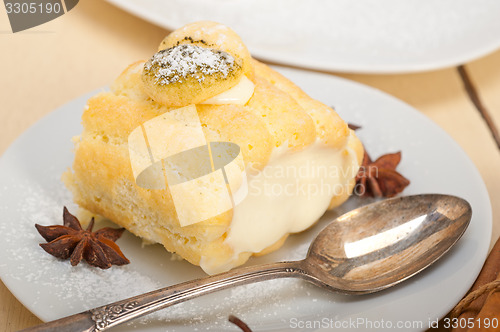 Image of cream roll cake dessert and spices 