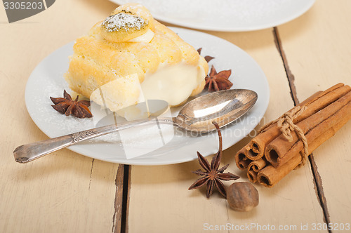 Image of cream roll cake dessert and spices 