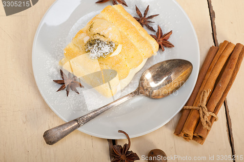 Image of cream roll cake dessert and spices 