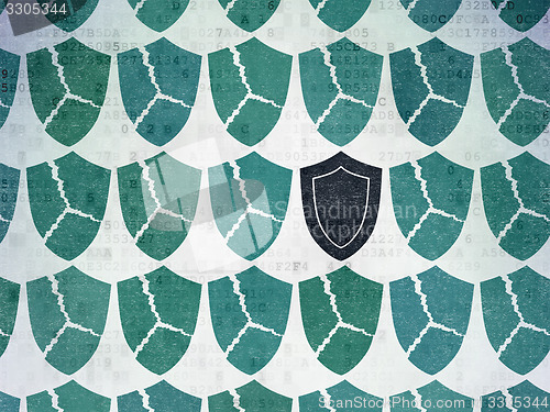Image of Safety concept: shield icon on Digital Paper background