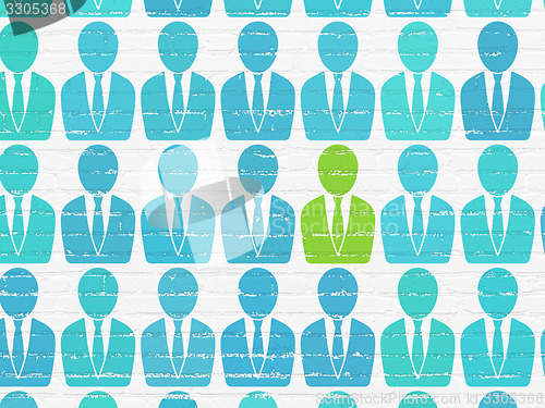 Image of Finance concept: business man icon on wall background