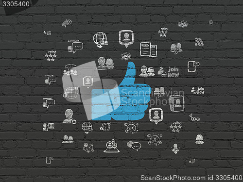 Image of Social media concept: Thumb Up on wall background