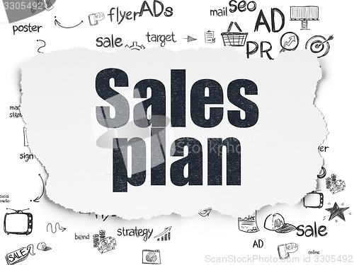 Image of Advertising concept: Sales Plan on Torn Paper background