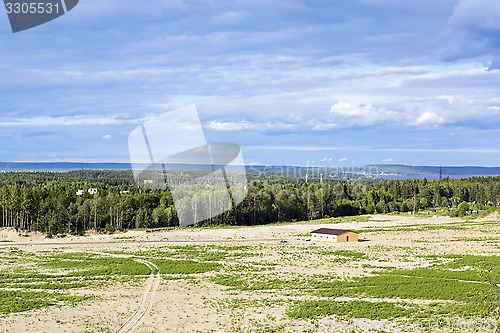 Image of Farm house on meadow forest