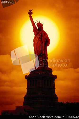 Image of liberty statue at sunset