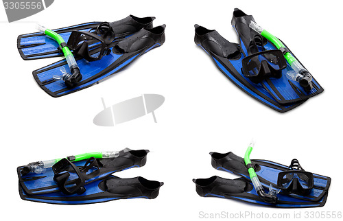 Image of Set of blue swim fins, mask and snorkel for diving on white back