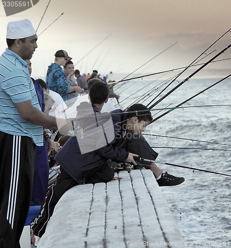 Image of Group of people fishing on False Bay waters