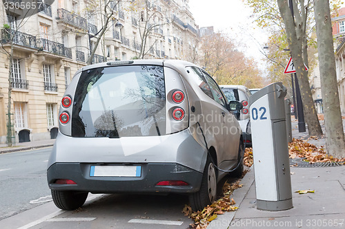 Image of Electric Car in Charging Station.