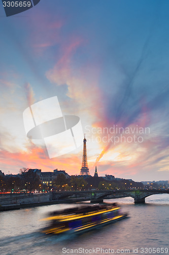 Image of Sunset over Eiffel Tower and Seine river.