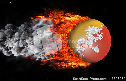 Image of Flag with a trail of fire and smoke - Bhutan