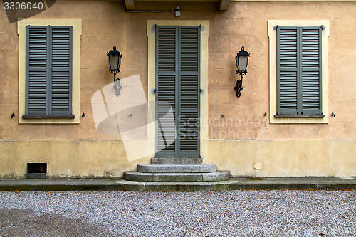 Image of brown door  europe  italy  lombardy       in  the milano  stret 