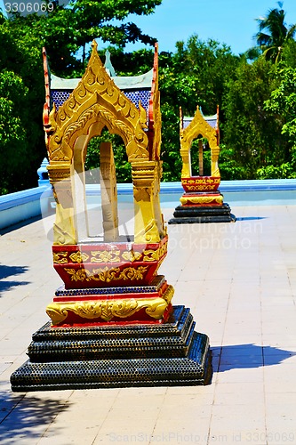 Image of kho samui sidewalk in thailand incision of the buddha gold  temp