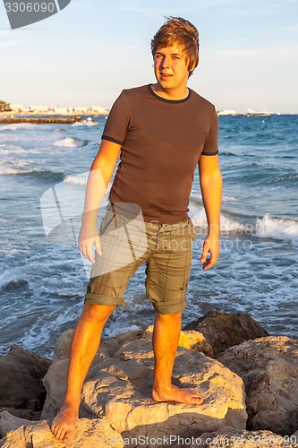 Image of The young guy on Croissette Beach in Cannes 