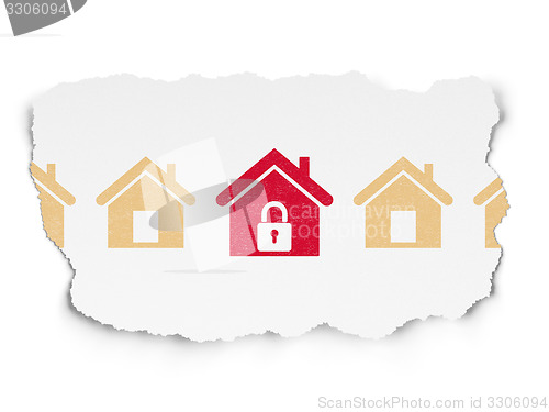 Image of Safety concept: home icon on Torn Paper background