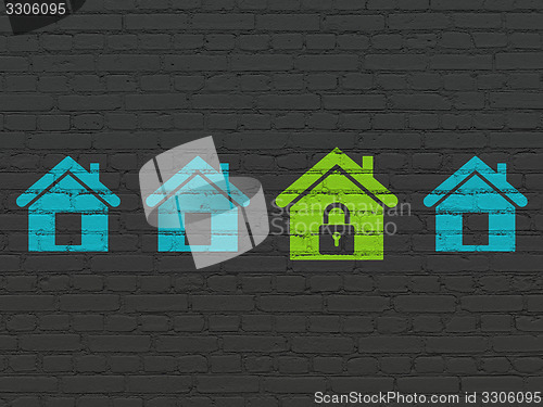 Image of Security concept: home icon on wall background
