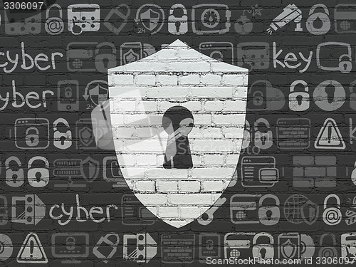 Image of Safety concept: Shield With Keyhole on wall background