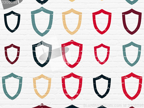 Image of Privacy concept: Contoured Shield icons on wall background