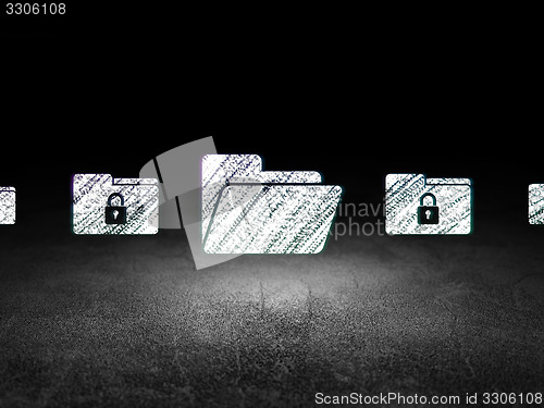 Image of Safety concept: folder icon in grunge dark room