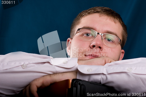 Image of Overworked businessman