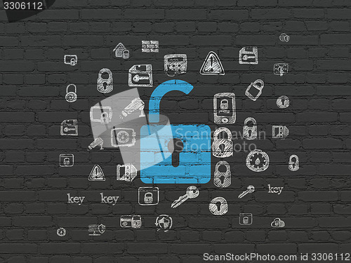 Image of Privacy concept: Opened Padlock on wall background