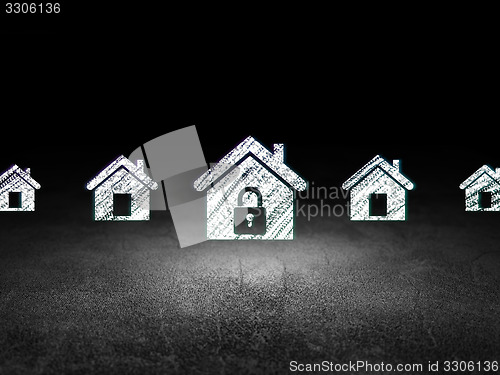 Image of Security concept: home icon in grunge dark room