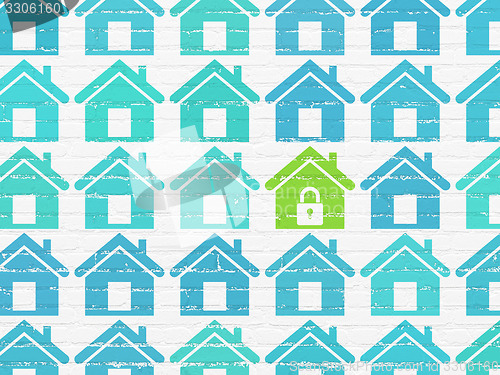 Image of Safety concept: home icon on wall background