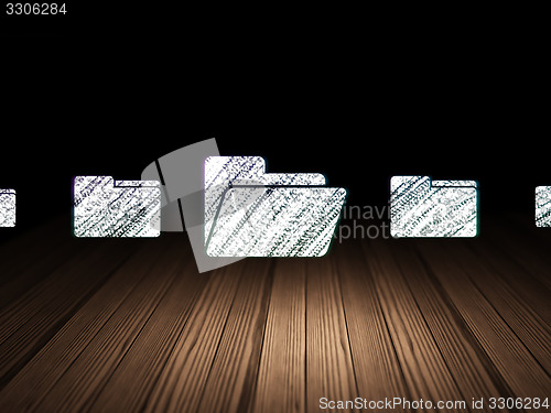 Image of Business concept: folder icon in grunge dark room