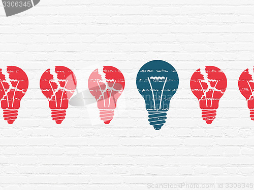 Image of Business concept: light bulb icon on wall background