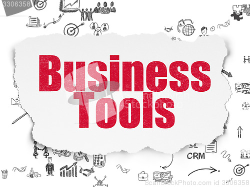 Image of Business concept: Business Tools on Torn Paper background