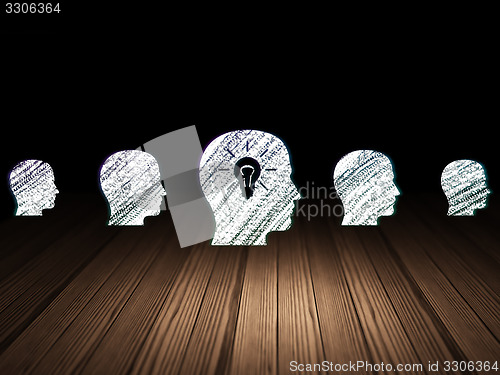 Image of Business concept: head with light bulb icon in grunge dark room