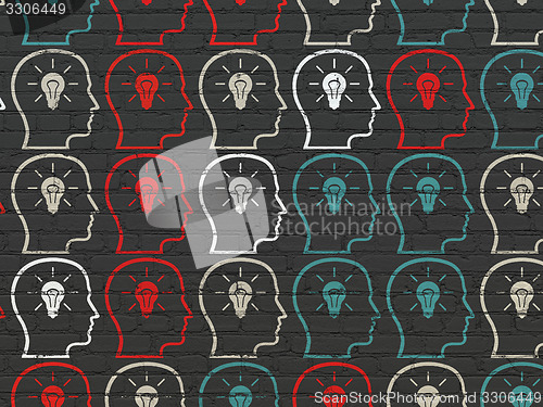 Image of Advertising concept: Head With Lightbulb icons on wall background