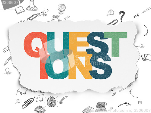 Image of Education concept: Questions? on Torn Paper background
