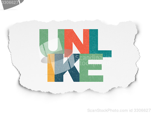 Image of Social media concept: Unlike on Torn Paper background