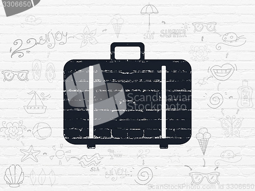 Image of Vacation concept: Bag on wall background