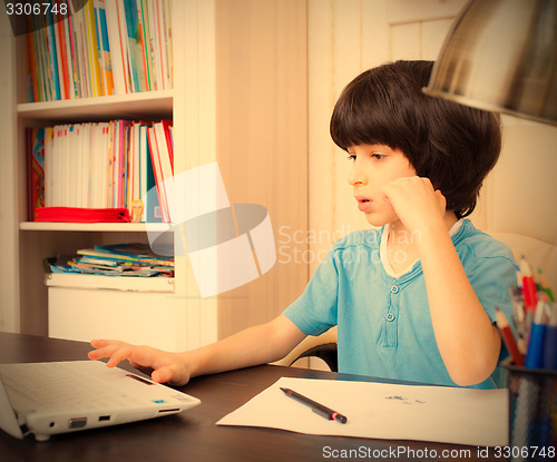 Image of child doing homework