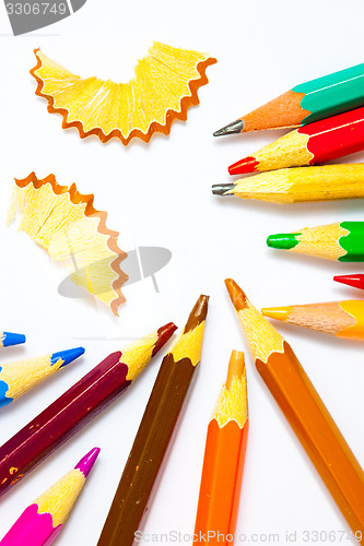 Image of several colored pencils and shavings